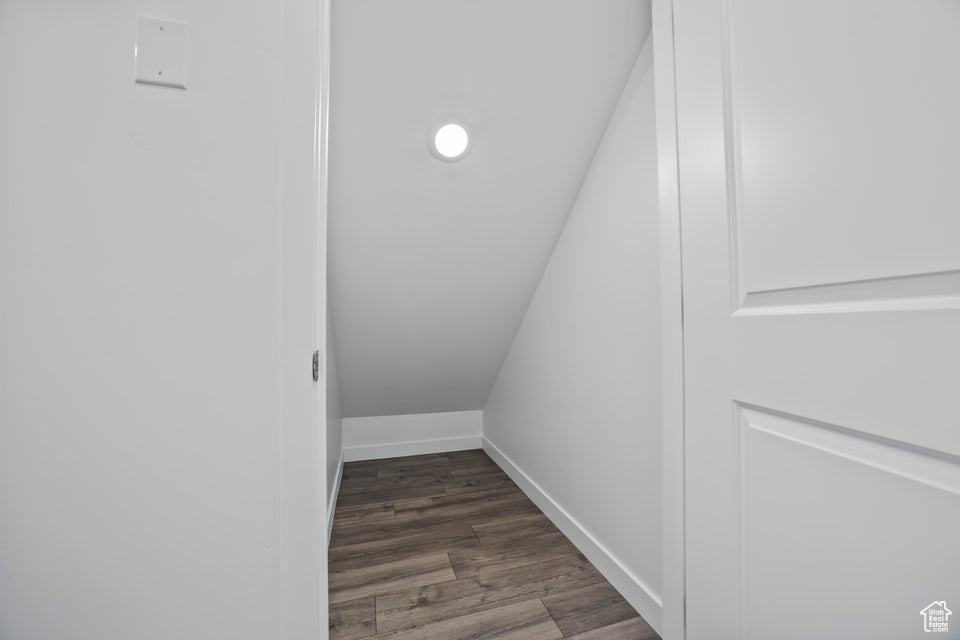 Detailed view of baseboards and wood finished floors