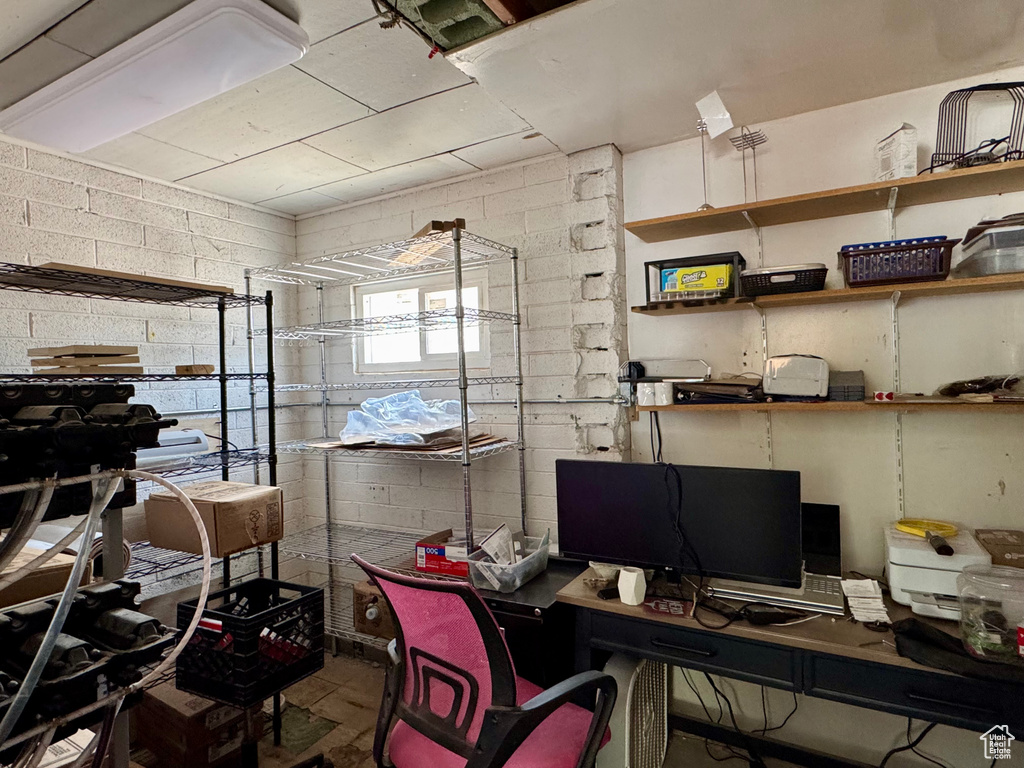 Office featuring concrete block wall