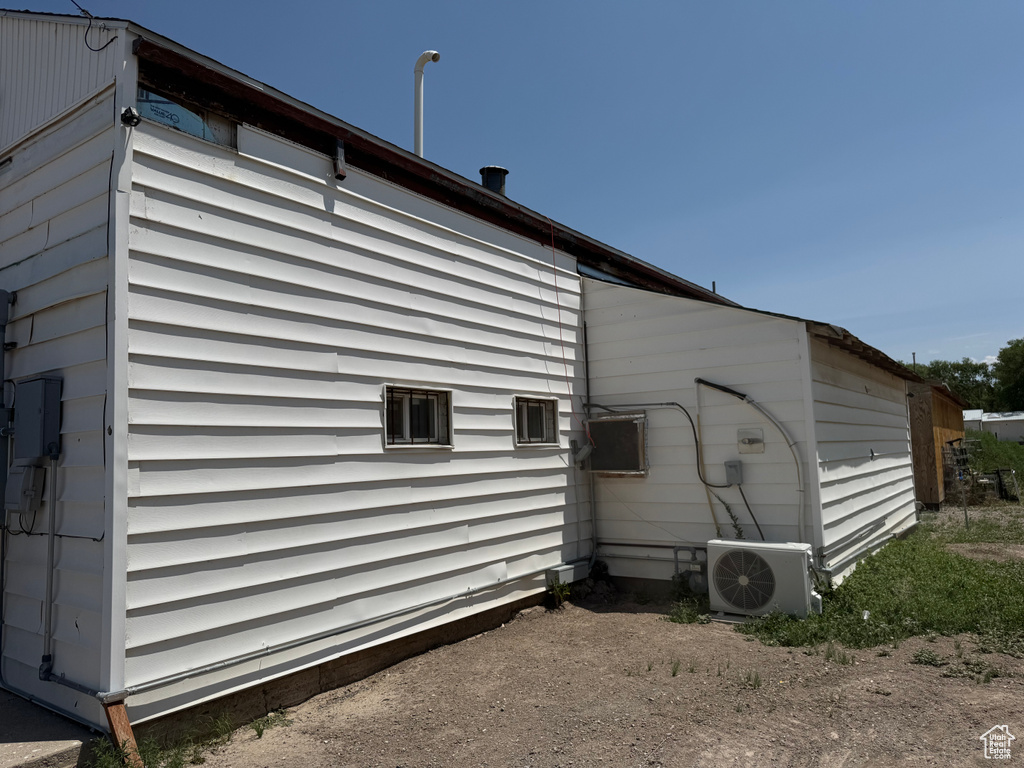 View of home\\\\\\\'s exterior featuring an ac unit