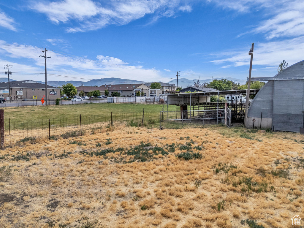 View of yard featuring a mountain view and a residential view