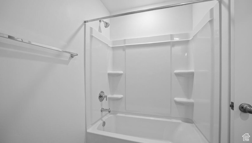 Full bath featuring tub / shower combination