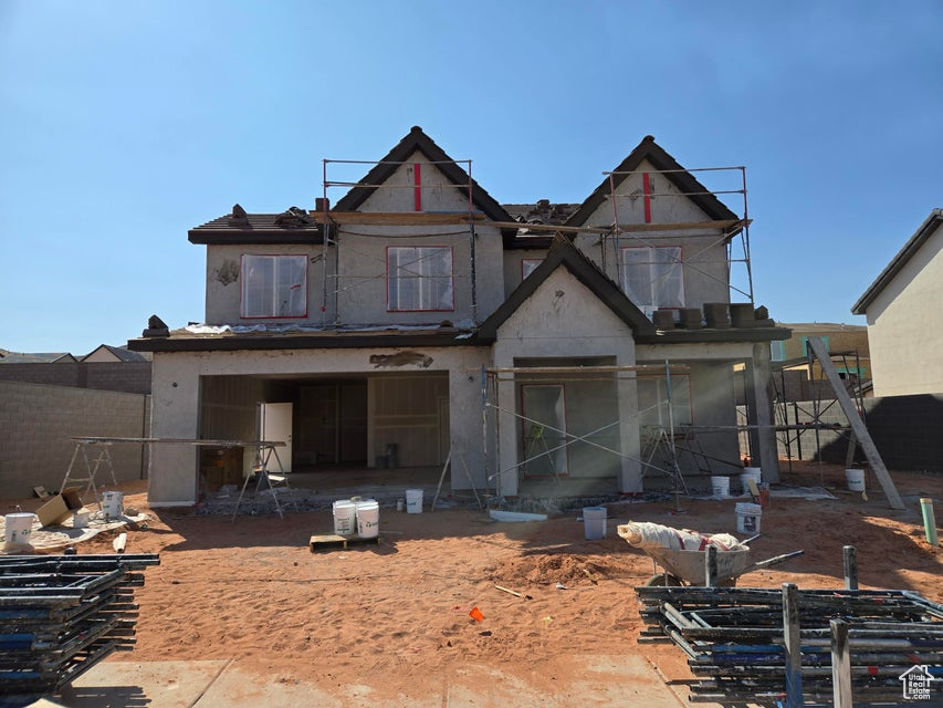 View of front of house with stucco siding