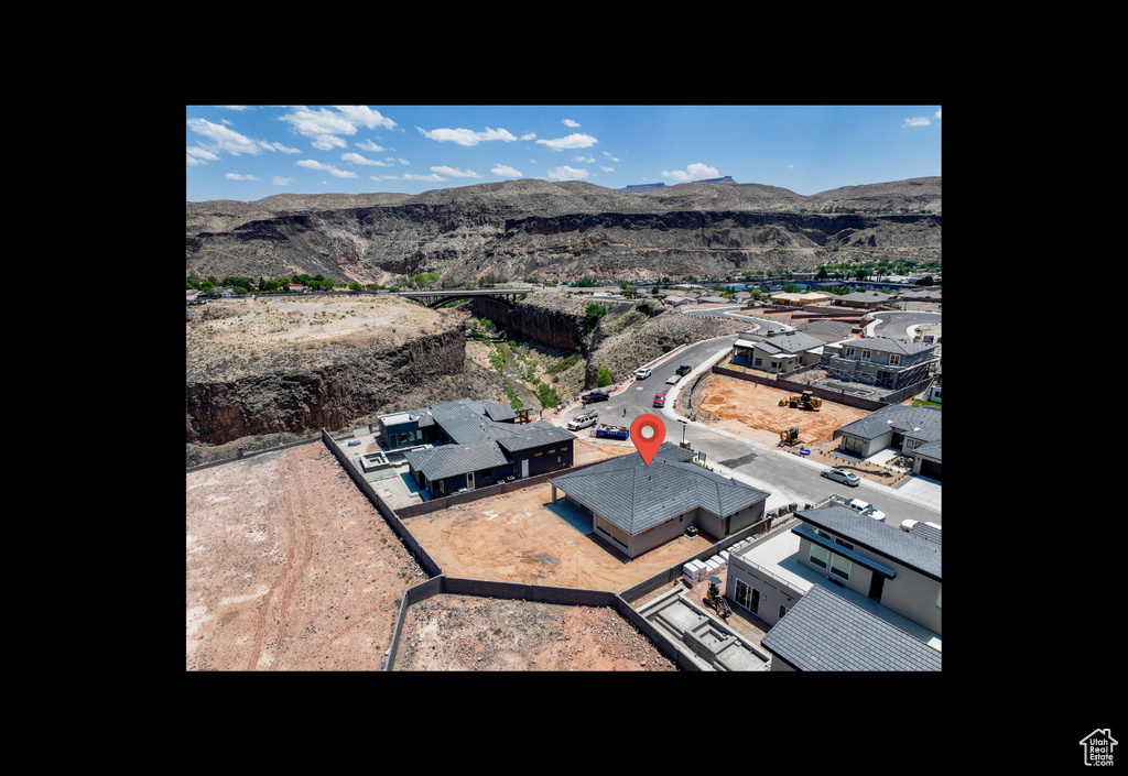 Aerial perspective of suburban area with mountains