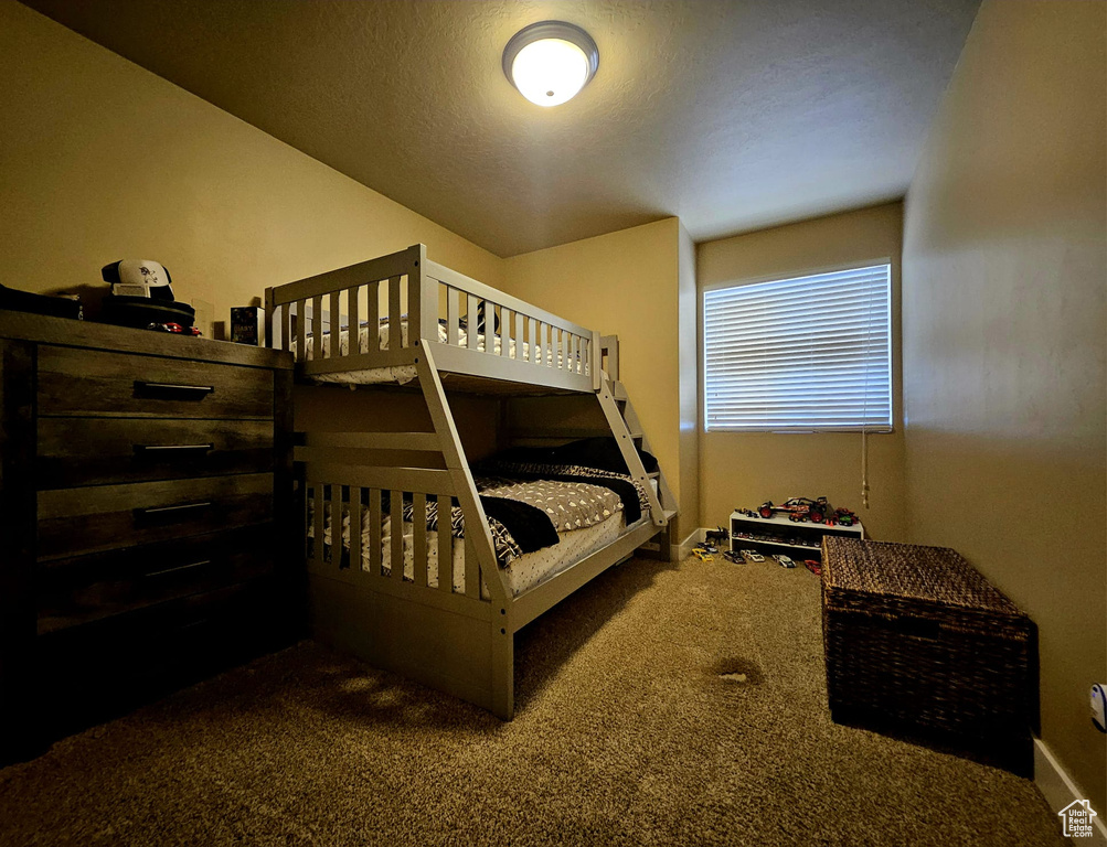 Bedroom featuring carpet