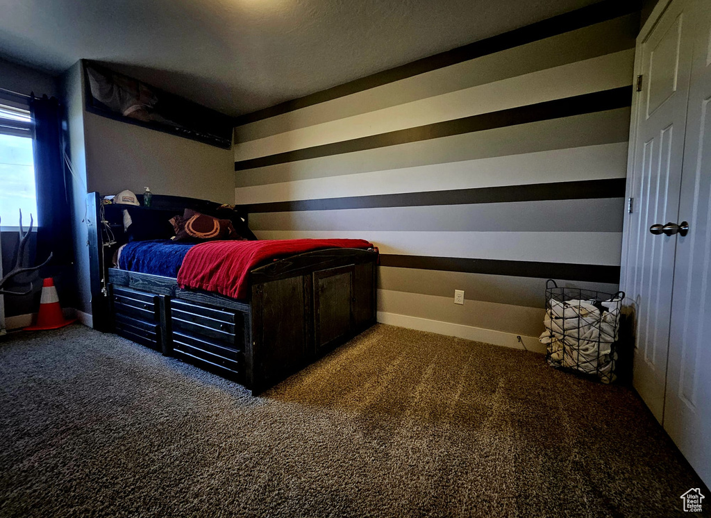 Bedroom featuring carpet