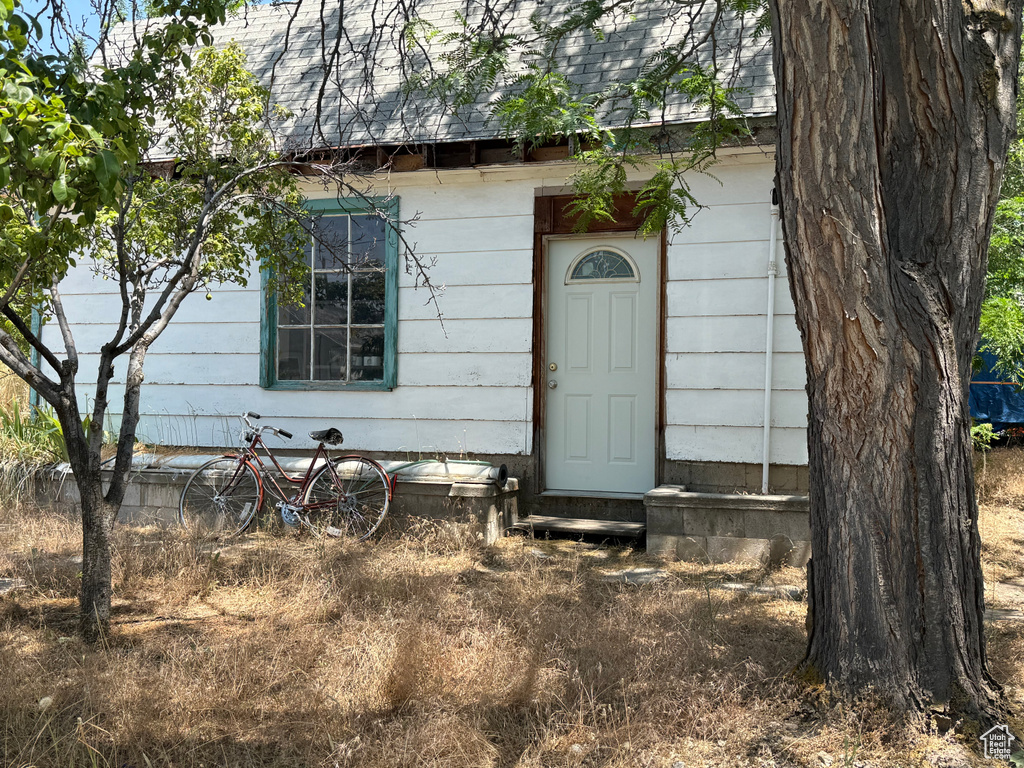 View of outbuilding with entry steps
