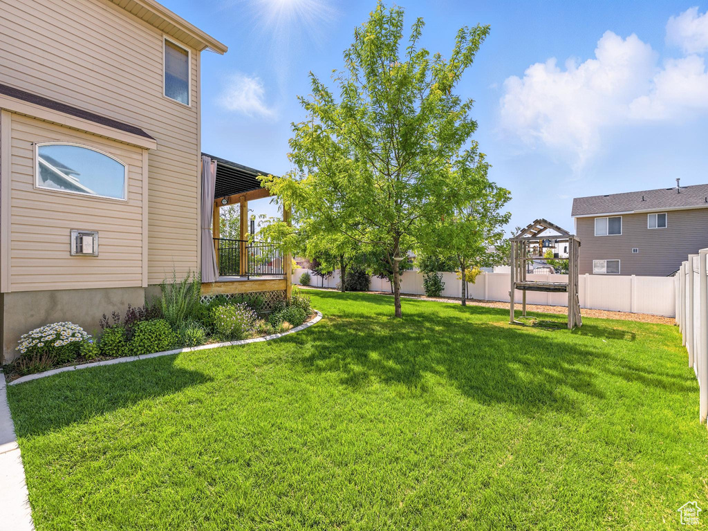 View of fenced backyard