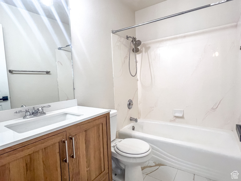 Bathroom featuring vanity and bathtub / shower combination