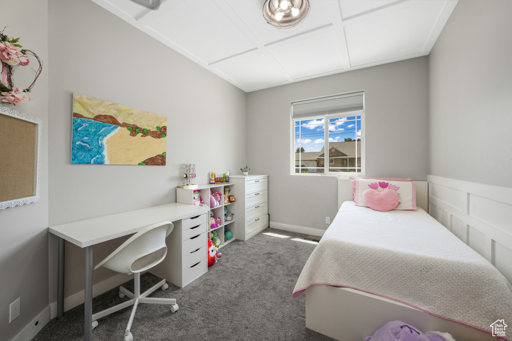 Bedroom with carpet flooring and baseboards