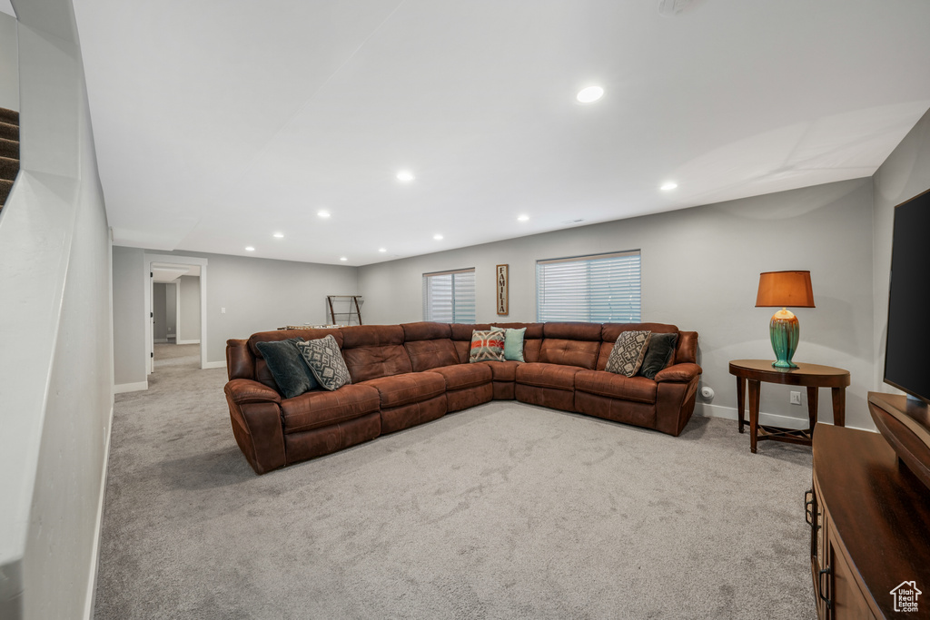 Living area featuring carpet and recessed lighting
