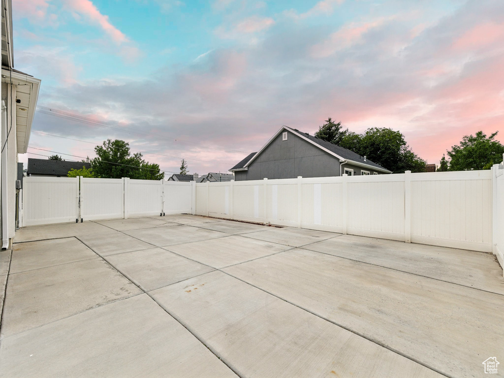 Fenced backyard featuring a patio area