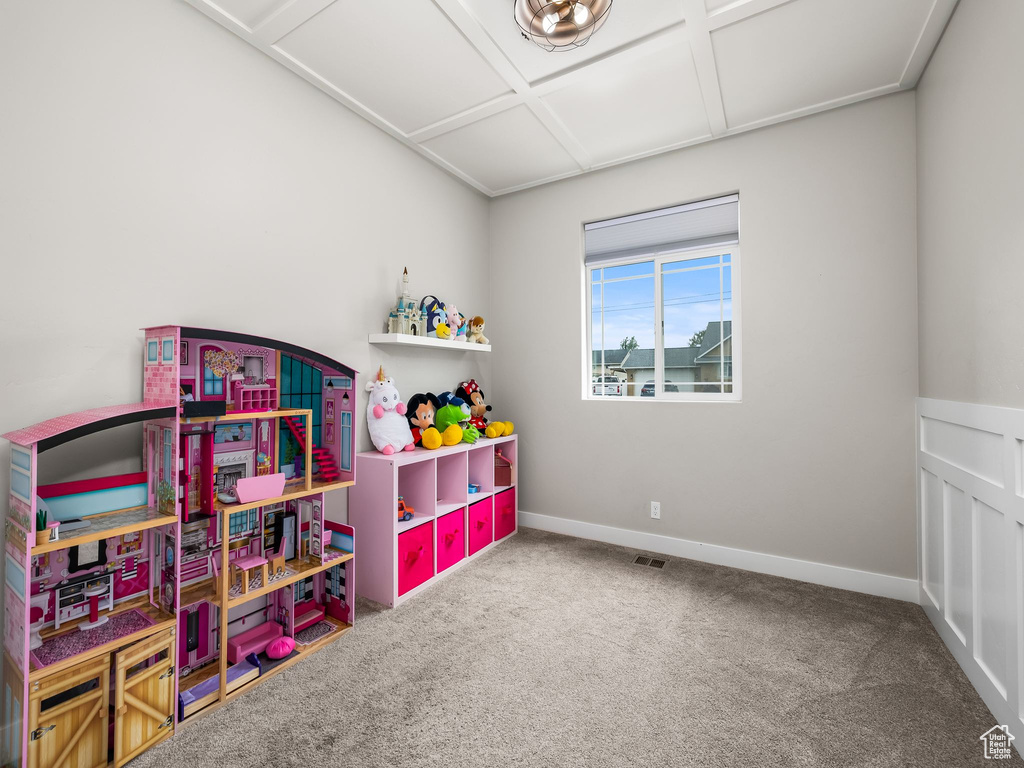 Game room featuring carpet flooring and baseboards