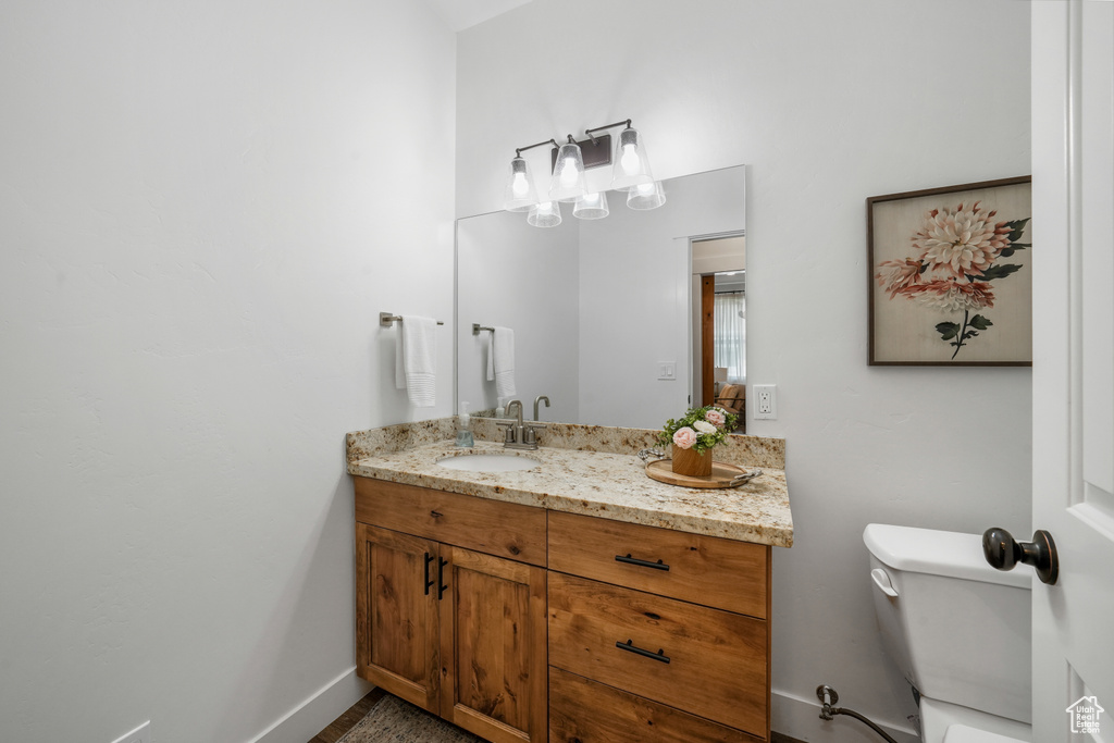 Bathroom featuring toilet and vanity