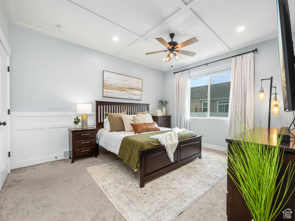 Bedroom with carpet, a wainscoted wall, recessed lighting, and ceiling fan