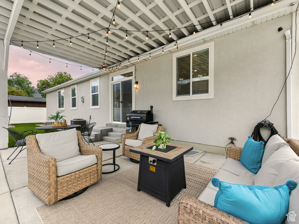 View of patio / terrace featuring grilling area, an outdoor hangout area, and entry steps