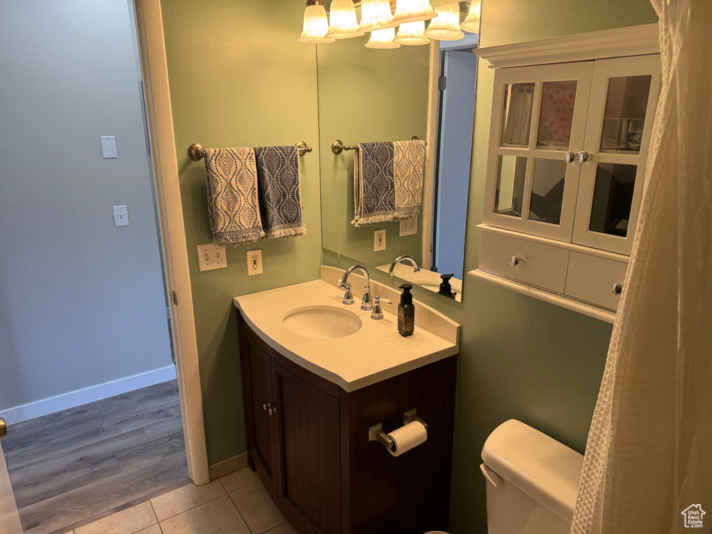 Bathroom with vanity and tile patterned floors