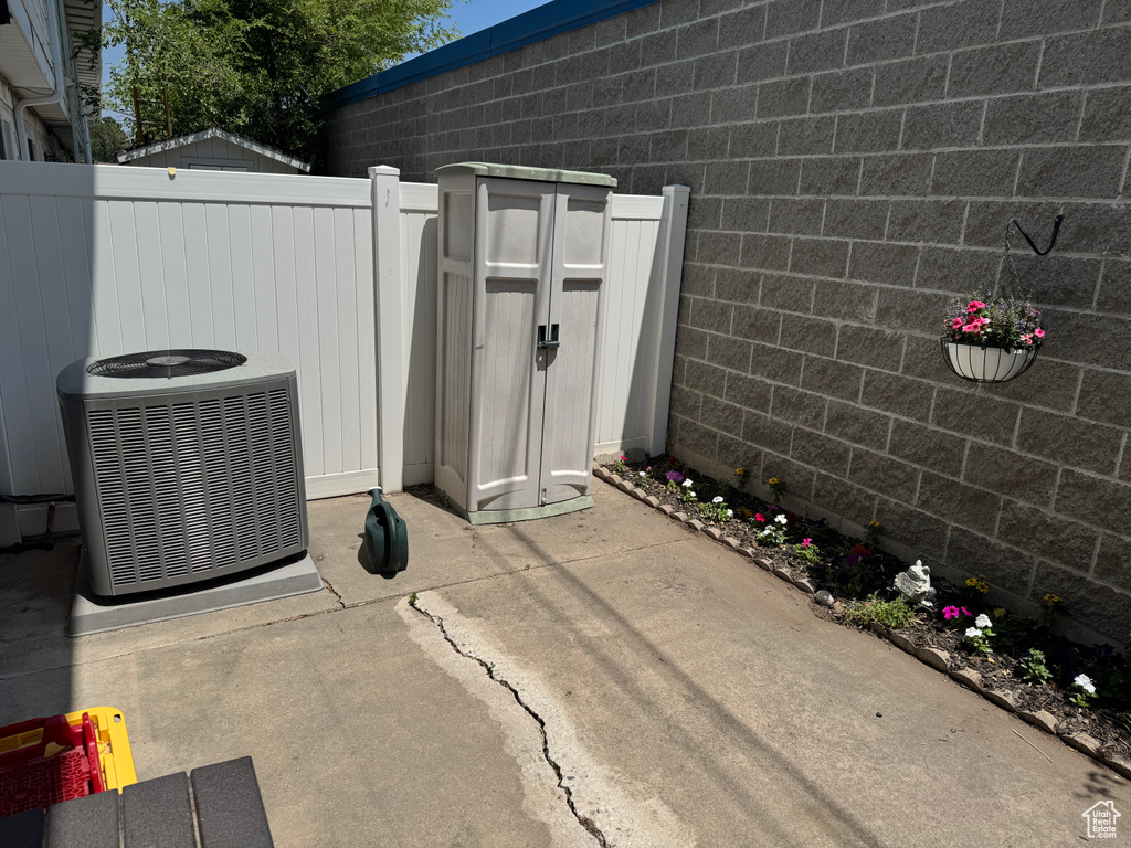 View of patio with a gate