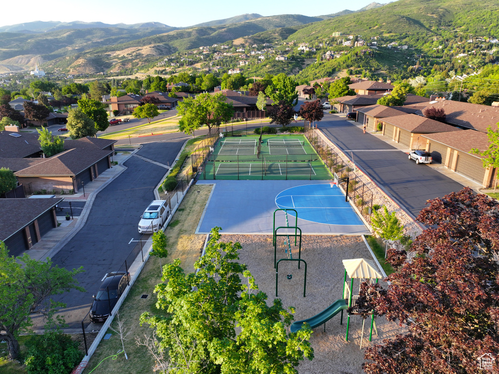 Aerial perspective of suburban area with mountains