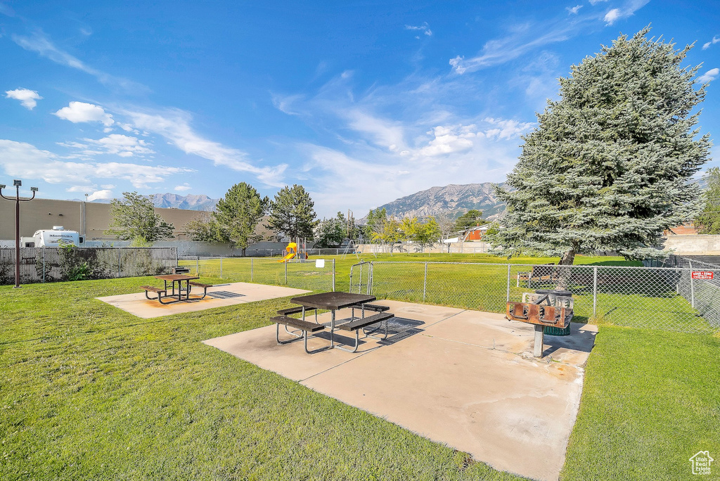 View of patio with a mountain view