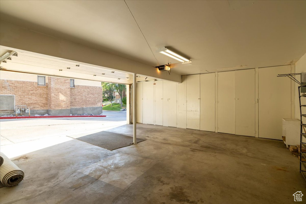 Garage featuring a garage door opener