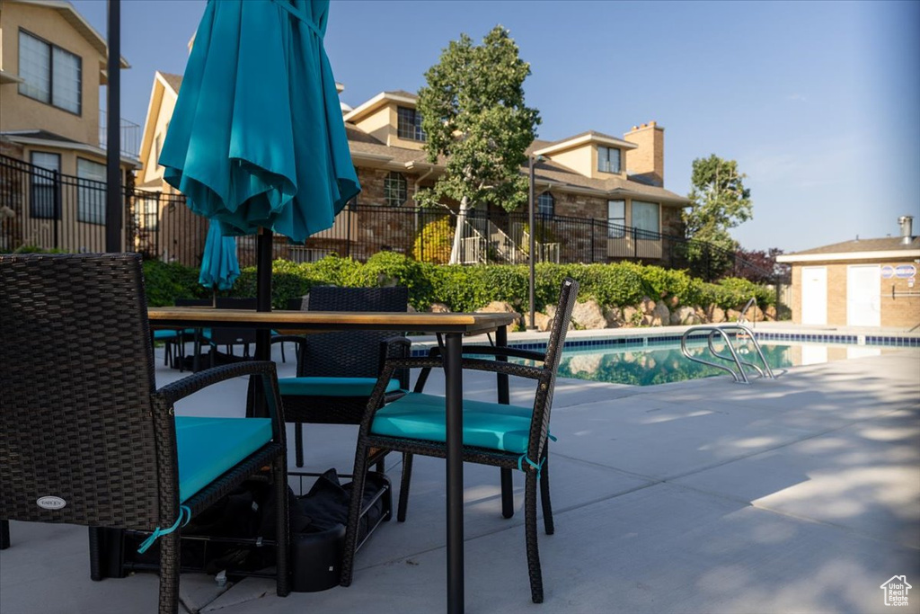 View of patio / terrace with a community pool