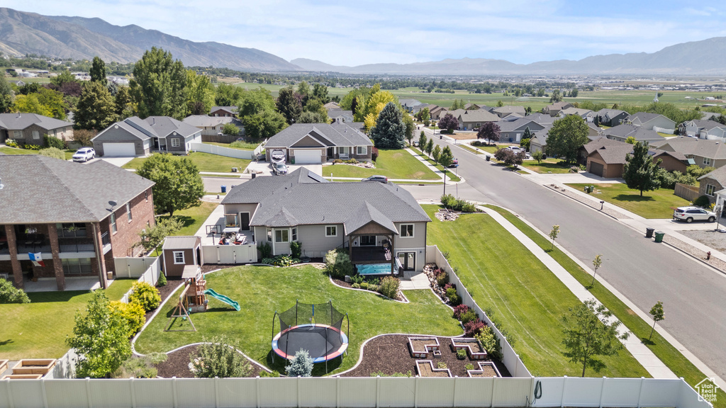Aerial perspective of suburban area featuring mountains