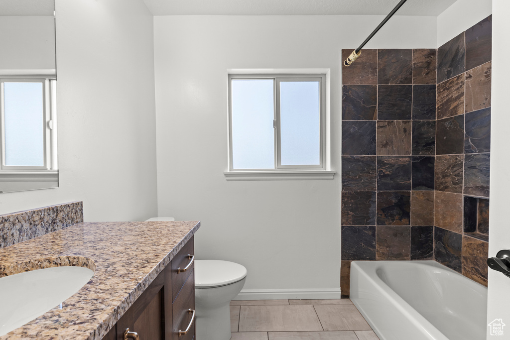 Full bathroom featuring vanity and  shower combination