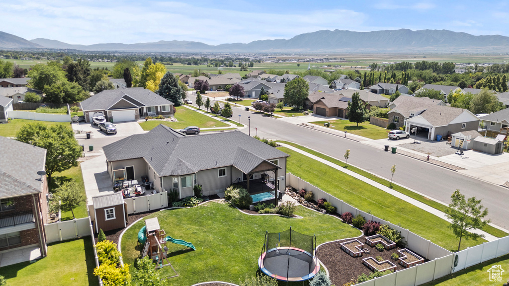 Aerial view of residential area featuring mountains