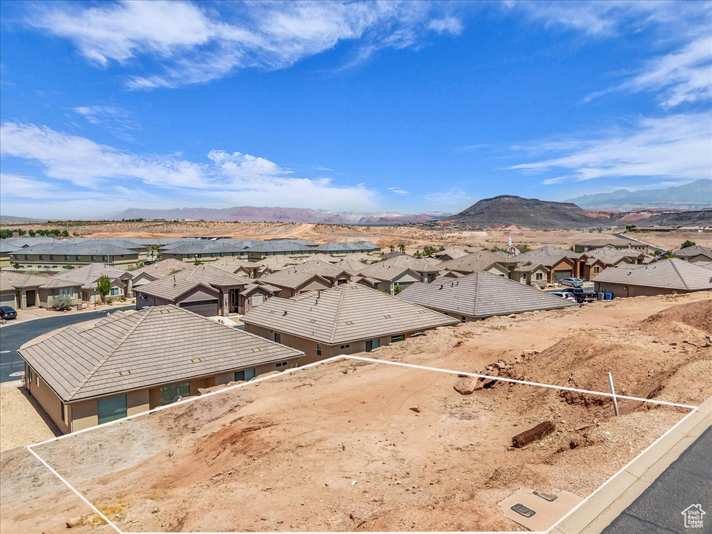 Aerial view of residential area with mountains