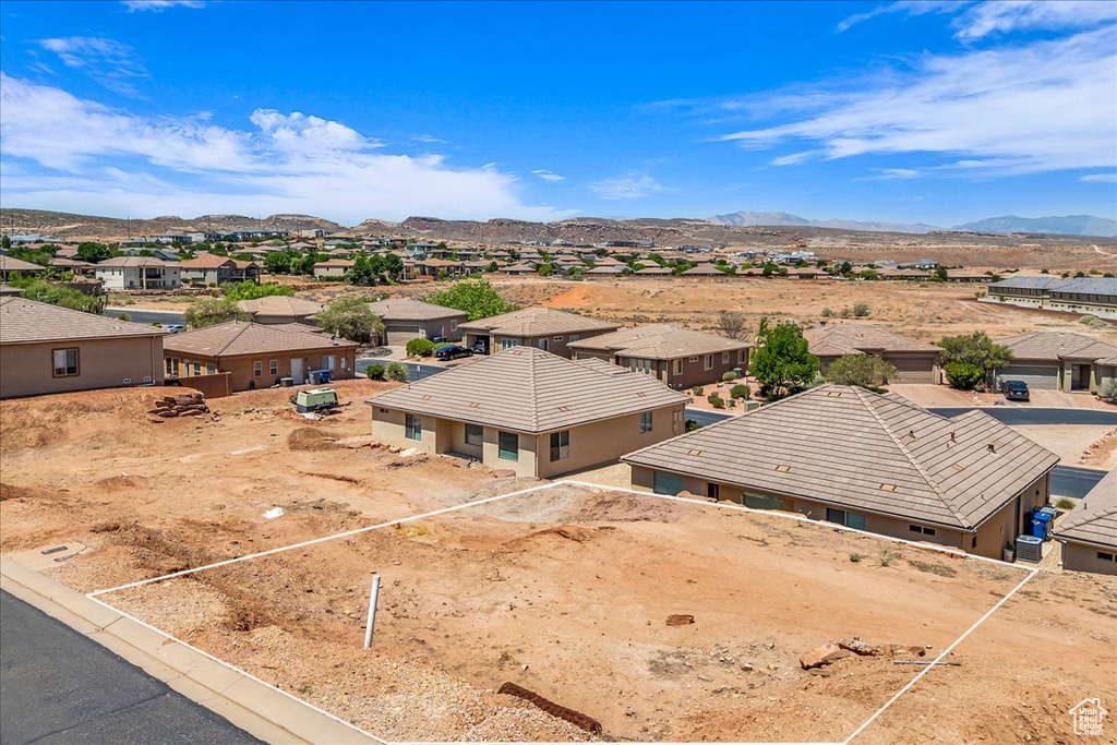Aerial perspective of suburban area with mountains
