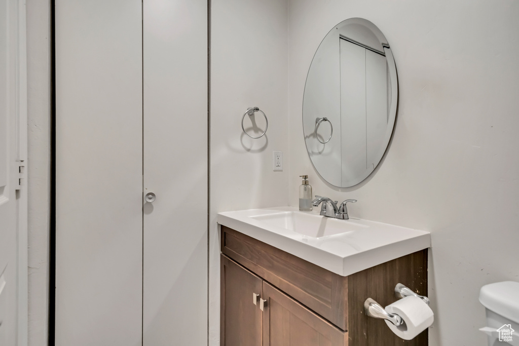 Bathroom with vanity and toilet