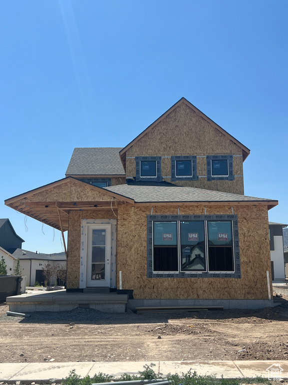 Property under construction featuring roof with shingles
