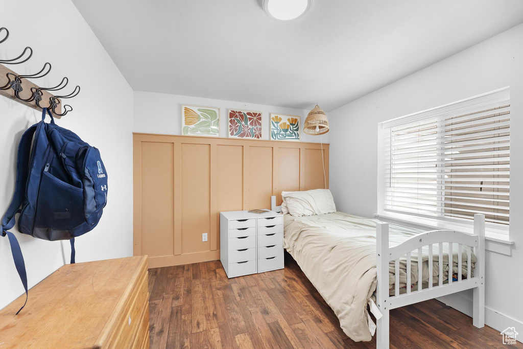 Bedroom with wood finished floors