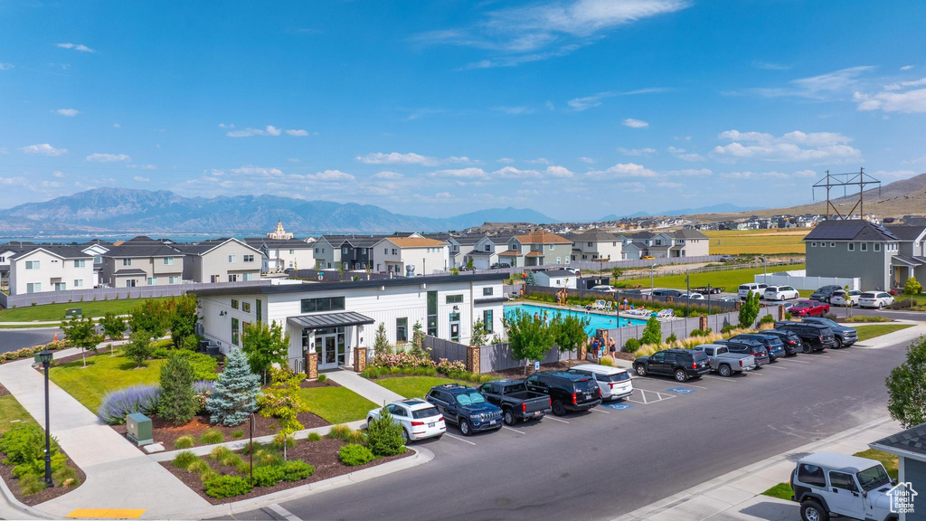Aerial view of residential area with a mountain backdrop