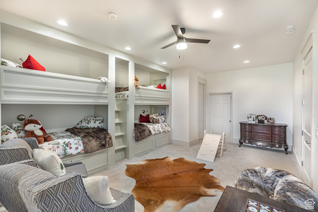 Bedroom with recessed lighting, light carpet, and a ceiling fan