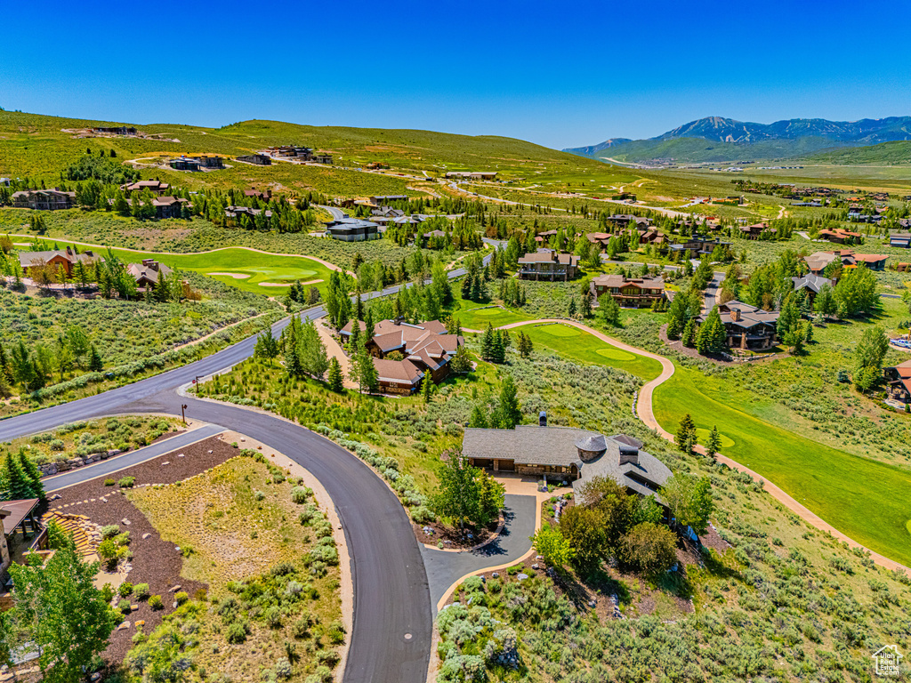 Aerial perspective of suburban area featuring mountains