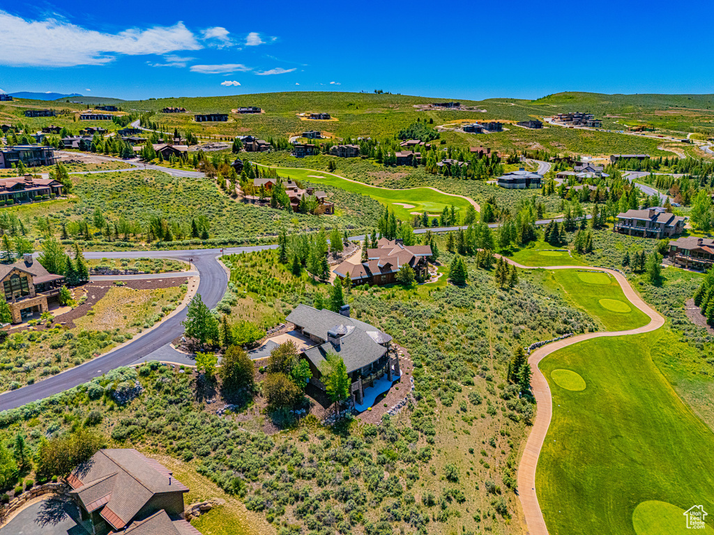 Aerial perspective of suburban area with a local golf course