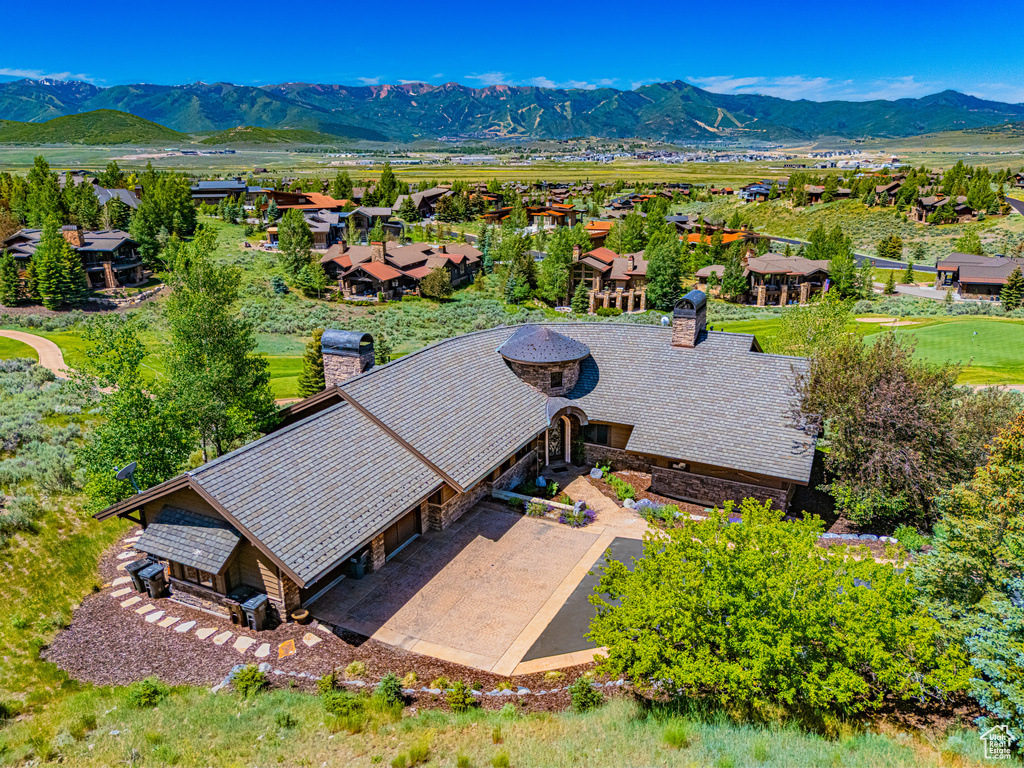 Aerial perspective of suburban area featuring mountains