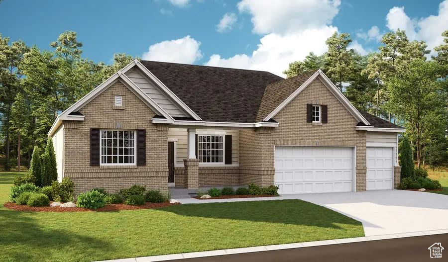 View of front facade featuring brick siding, driveway, a front yard, and a shingled roof