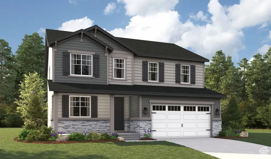 Craftsman-style house featuring stone siding, a garage, and a front yard