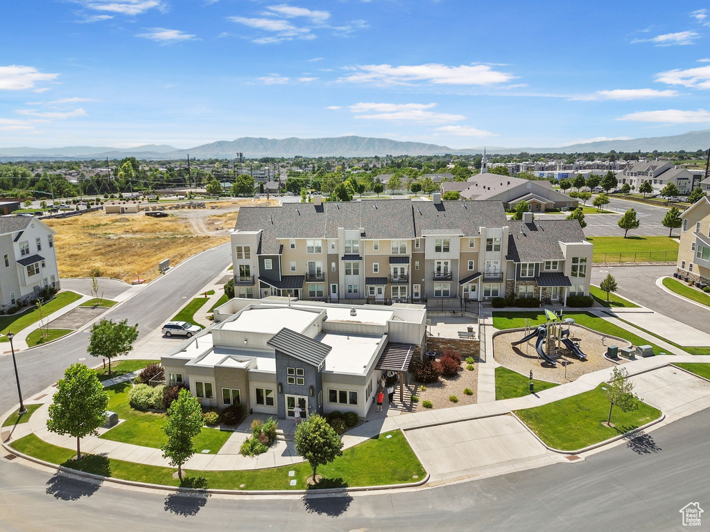 Aerial perspective of suburban area with a mountain backdrop