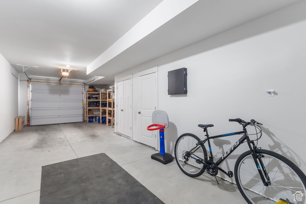 Garage featuring a garage door opener