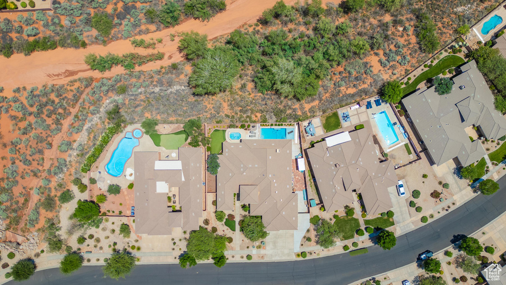 Aerial view of property\'s location with a pool