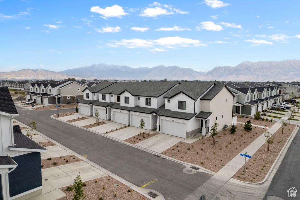 Aerial perspective of suburban area with mountains