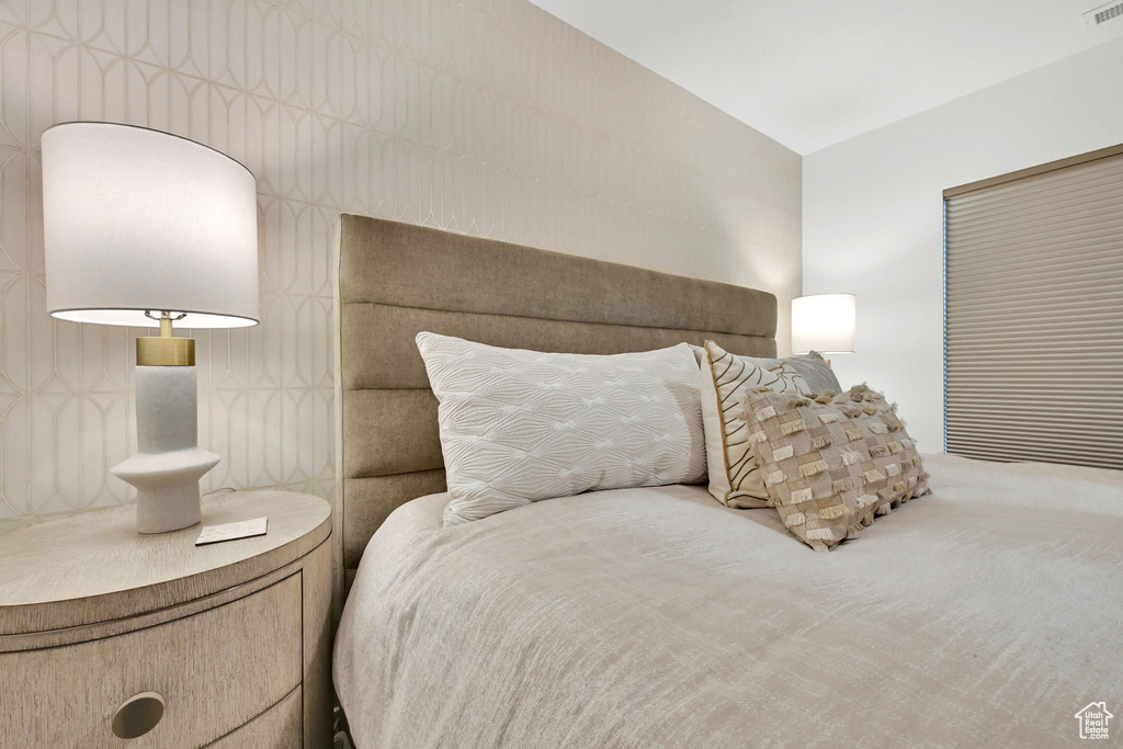 Bedroom with vaulted ceiling