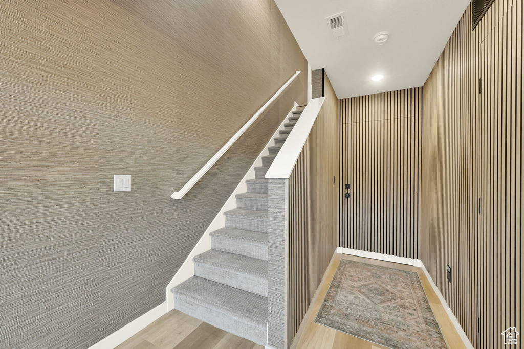 Staircase with wood finished floors