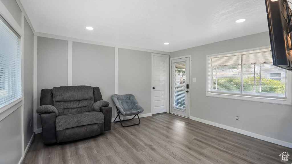 Sitting room featuring wood finished floors and recessed lighting