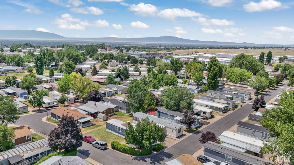 Aerial view of residential area with a mountainous background