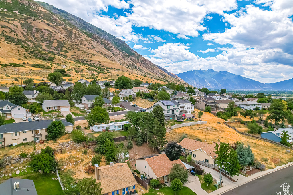 Birds eye view of property featuring a residential view and a mountain view