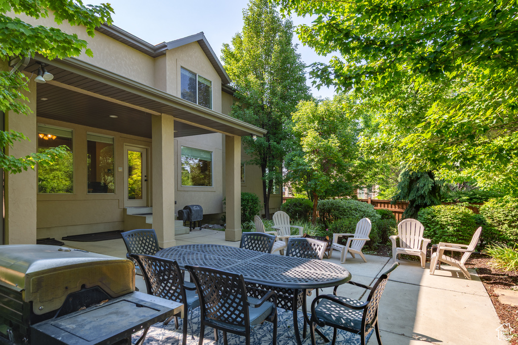 View of patio with outdoor dining area